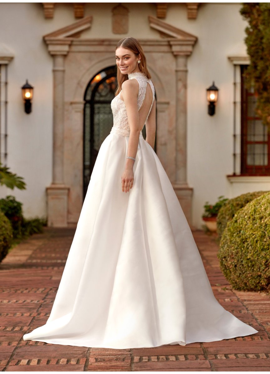 VESTIDO PEDRERIA CON SOBREFALDA PIQUE