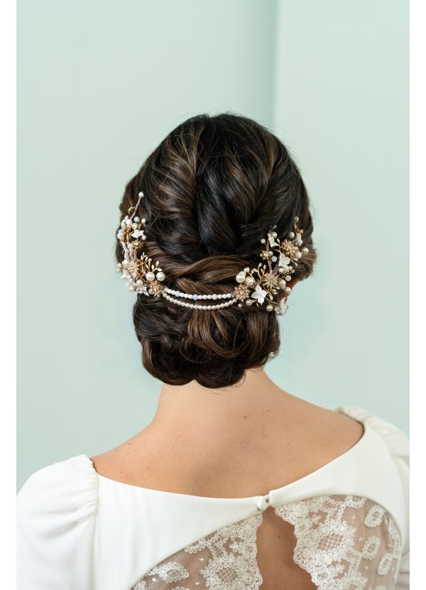 Tocado de novia floral en...