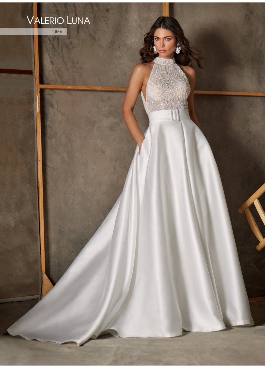 VESTIDO CREPE.PEDRERIA Y SOBREFALDA PIQU